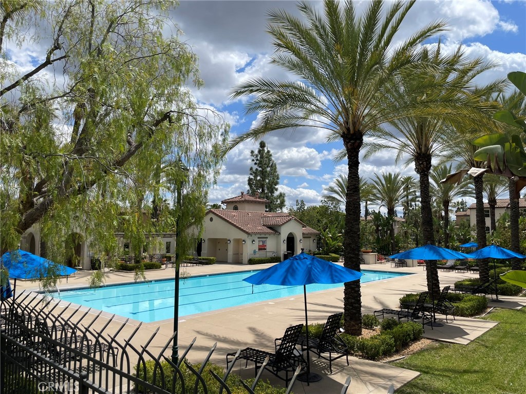 810 The Promenade, Unit C Azusa, CA 91702 - Photo 34 of 38 a view of a patio with swimming pool