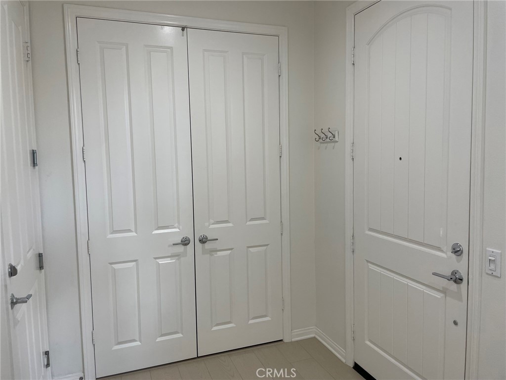 810 The Promenade, Unit C Azusa, CA 91702 - Photo 5 of 38 a view of a closet area
