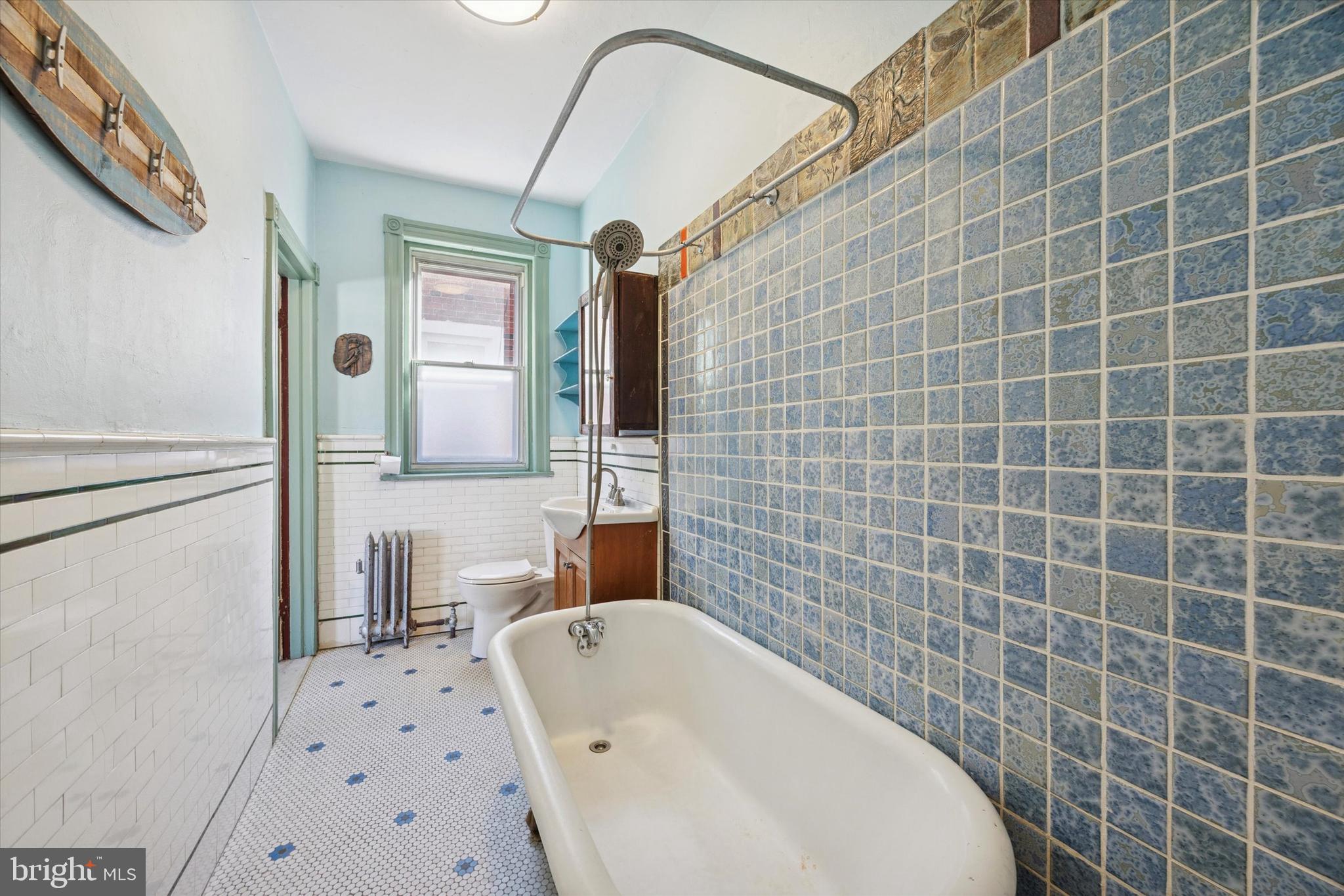 1227 South 53rd Street Philadelphia, PA 19143 - Photo 26 of 31 a bathroom with a bathtub and a shower