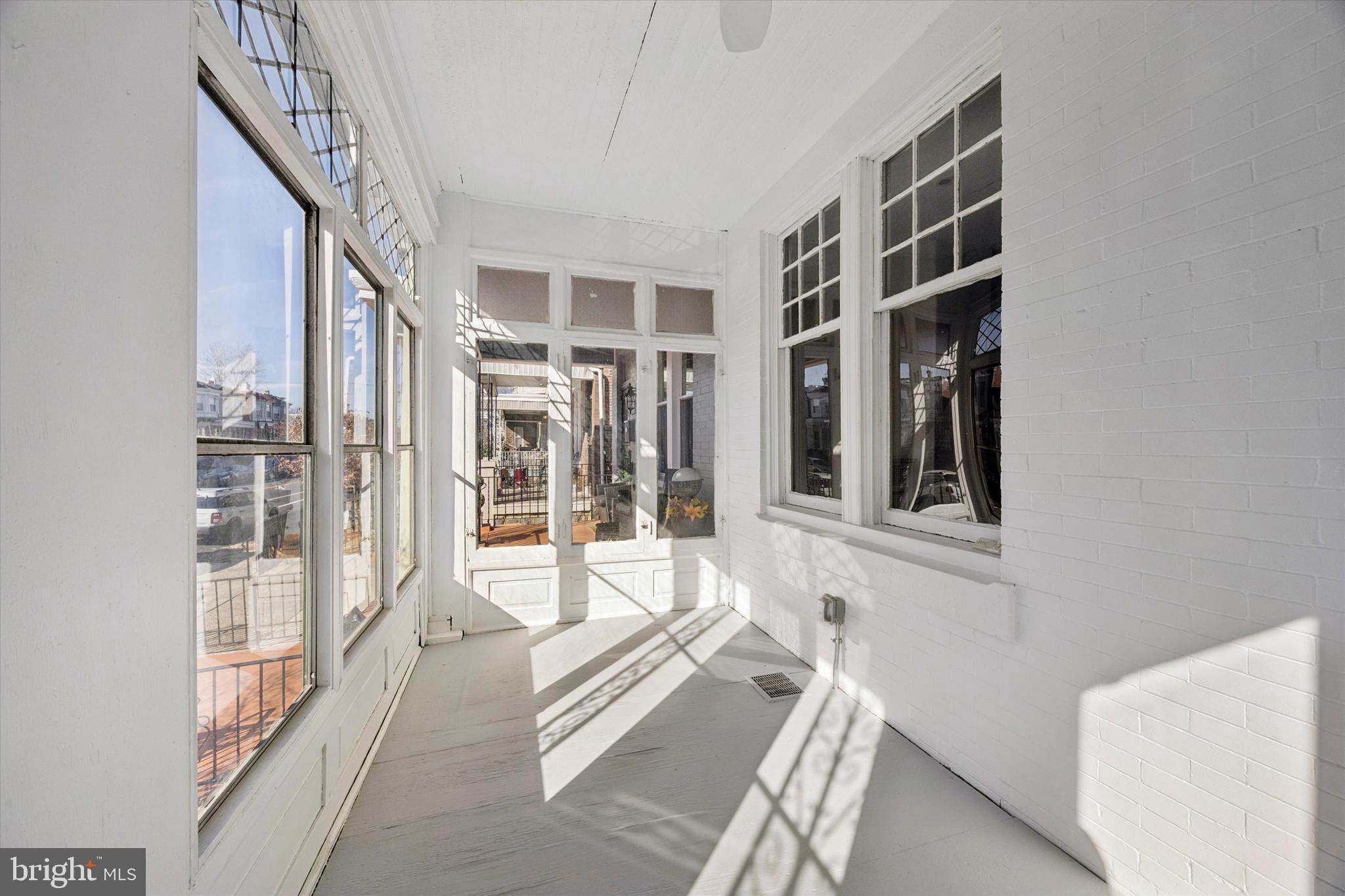 1227 South 53rd Street Philadelphia, PA 19143 - Photo 3 of 31 a view of a hallway with windows