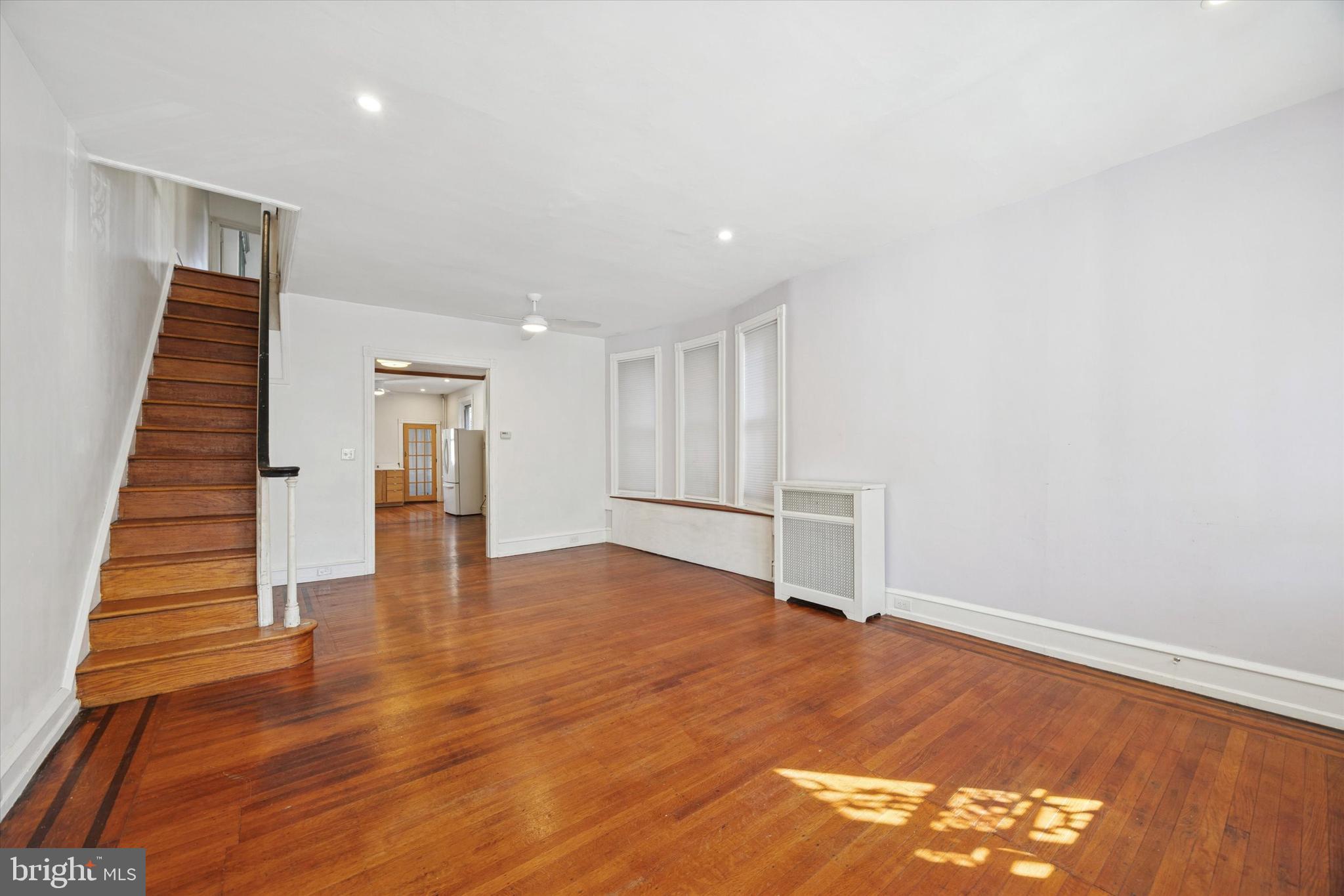 1227 South 53rd Street Philadelphia, PA 19143 - Photo 7 of 31 a view of empty room with wooden floor