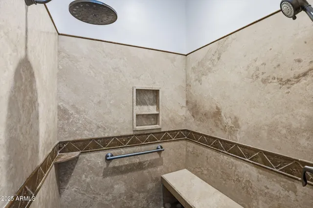 a bathroom with a sink and a shower