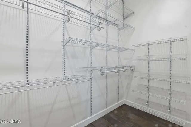 a view of a room with racks on the wall