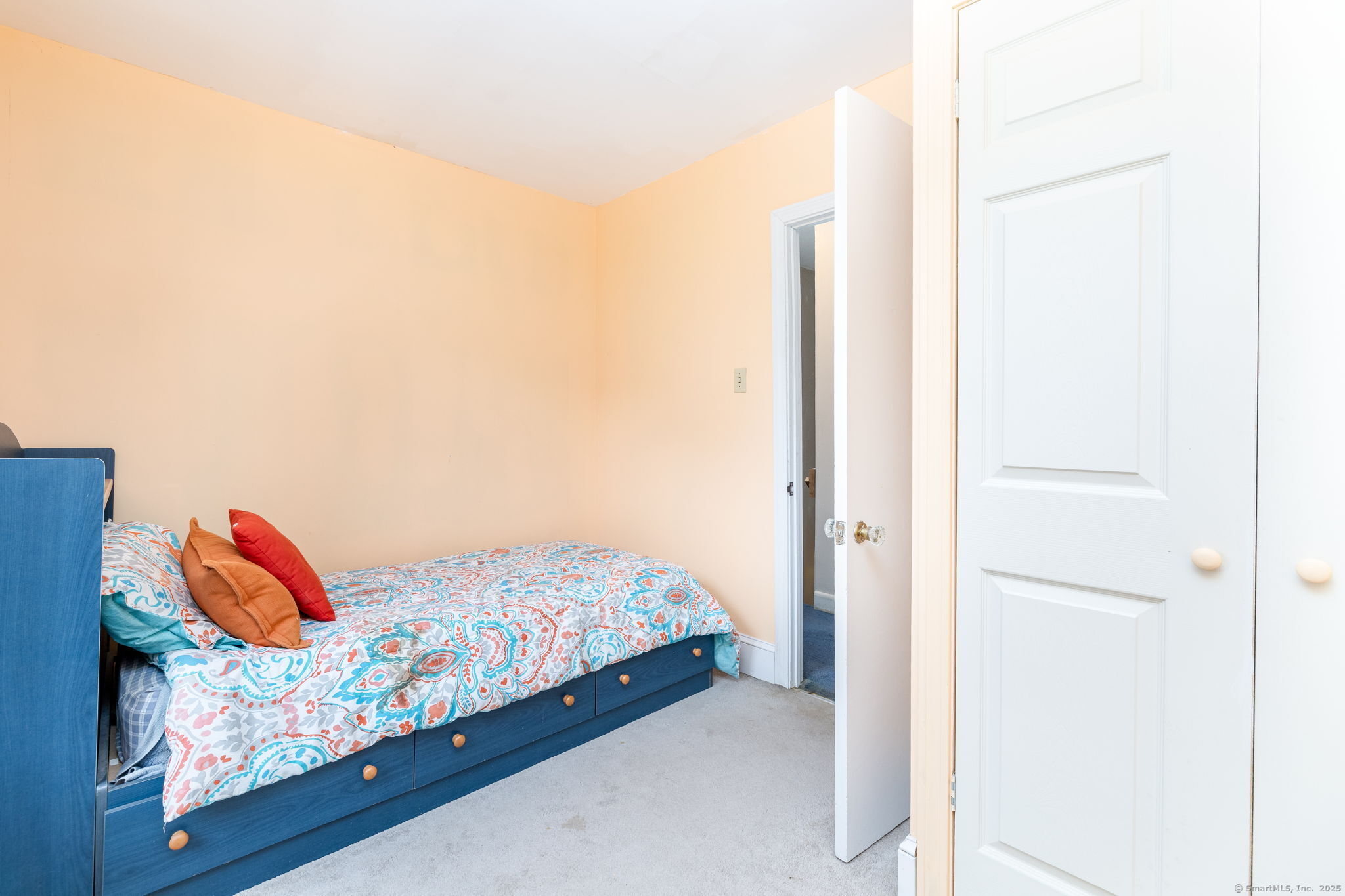 548 Worthington Ridge Berlin, CT 06037 - Photo 23 of 40 a bedroom with a bed and a couch