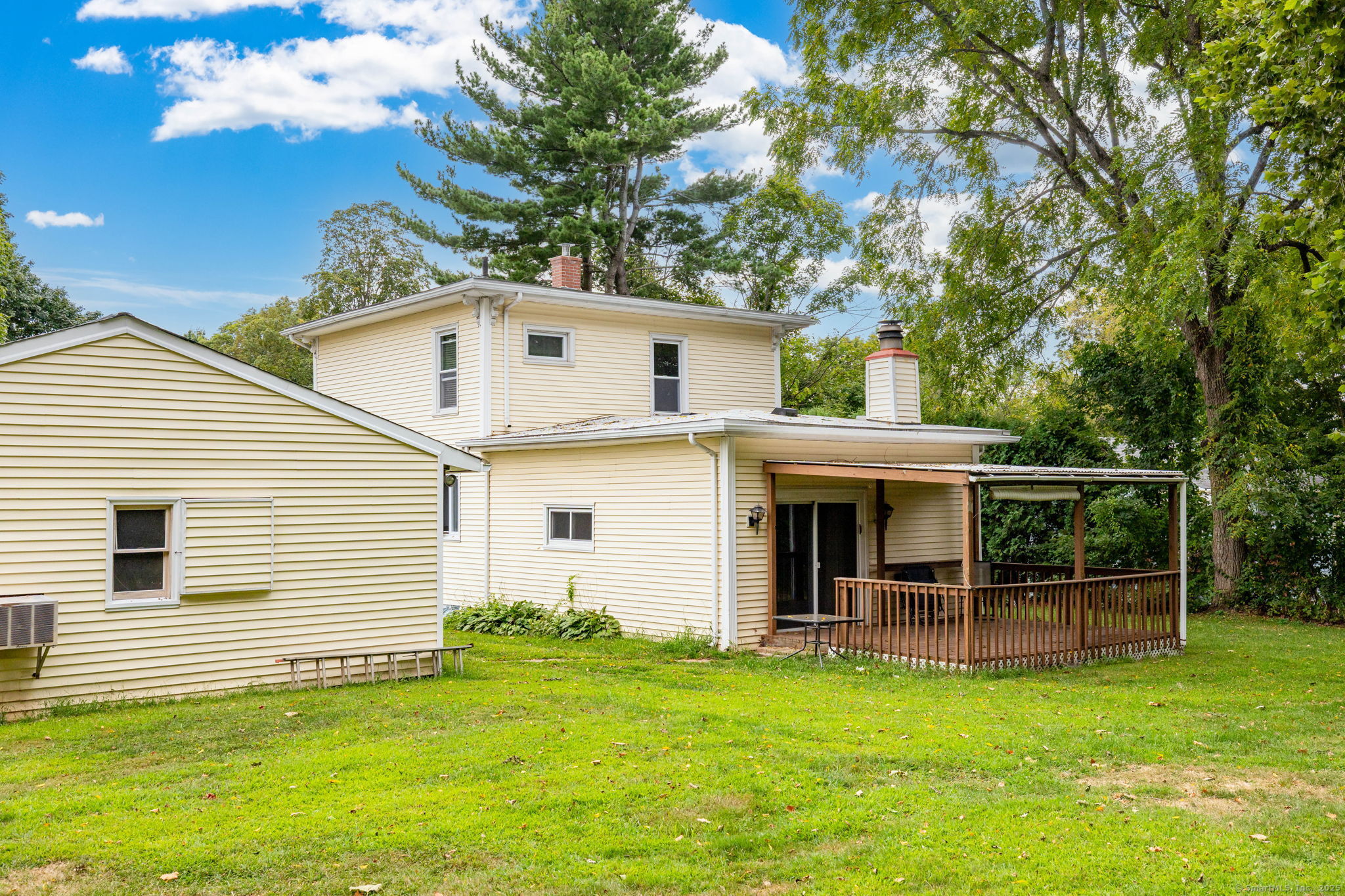 548 Worthington Ridge Berlin, CT 06037 - Photo 30 of 40 a view of a house with backyard porch and sitting area