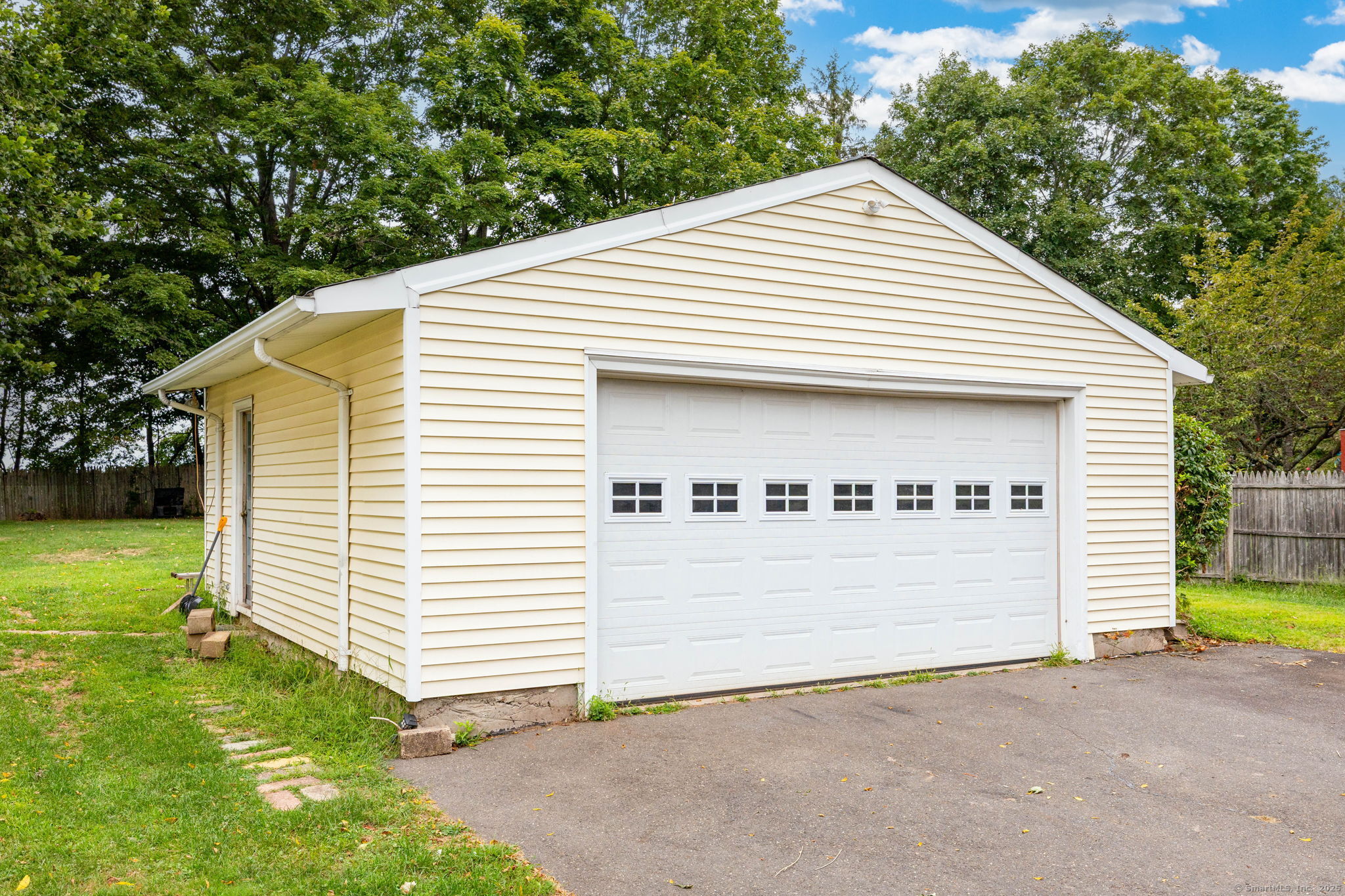548 Worthington Ridge Berlin, CT 06037 - Photo 34 of 40 a view of a house with a yard and garage