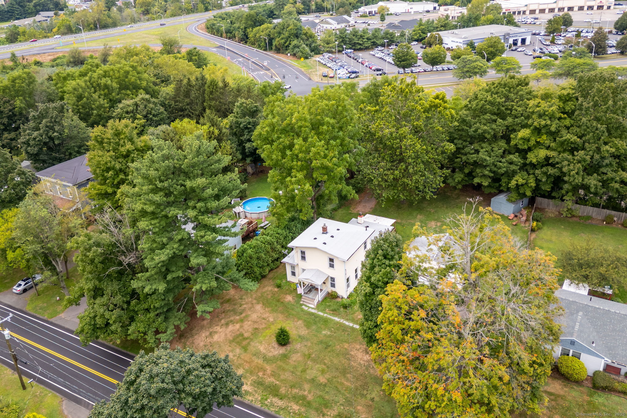 548 Worthington Ridge Berlin, CT 06037 - Photo 35 of 40 an aerial view of residential house with swimming pool and lawn chairs