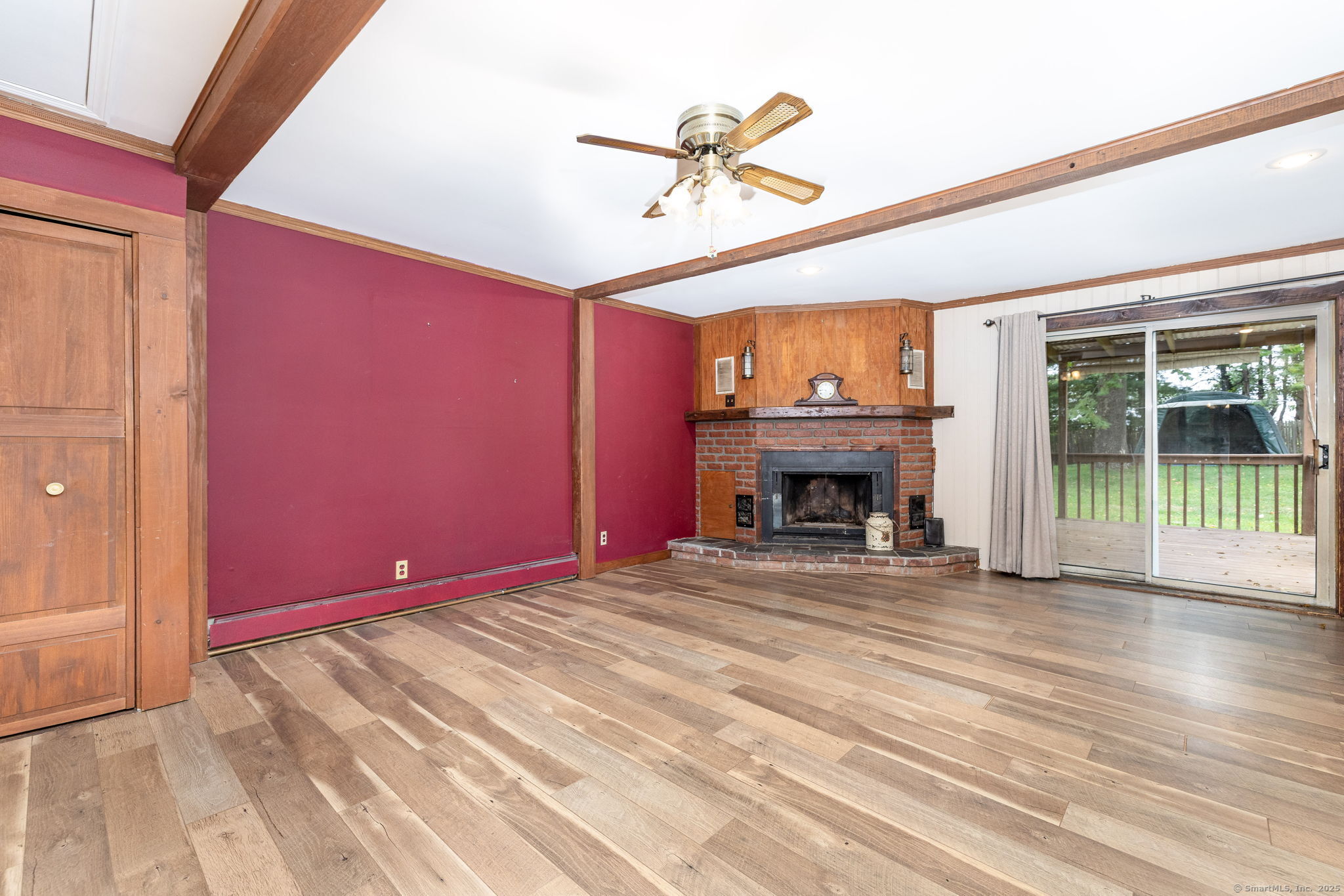 548 Worthington Ridge Berlin, CT 06037 - Photo 10 of 40 a view of livingroom with fireplace fan and windows