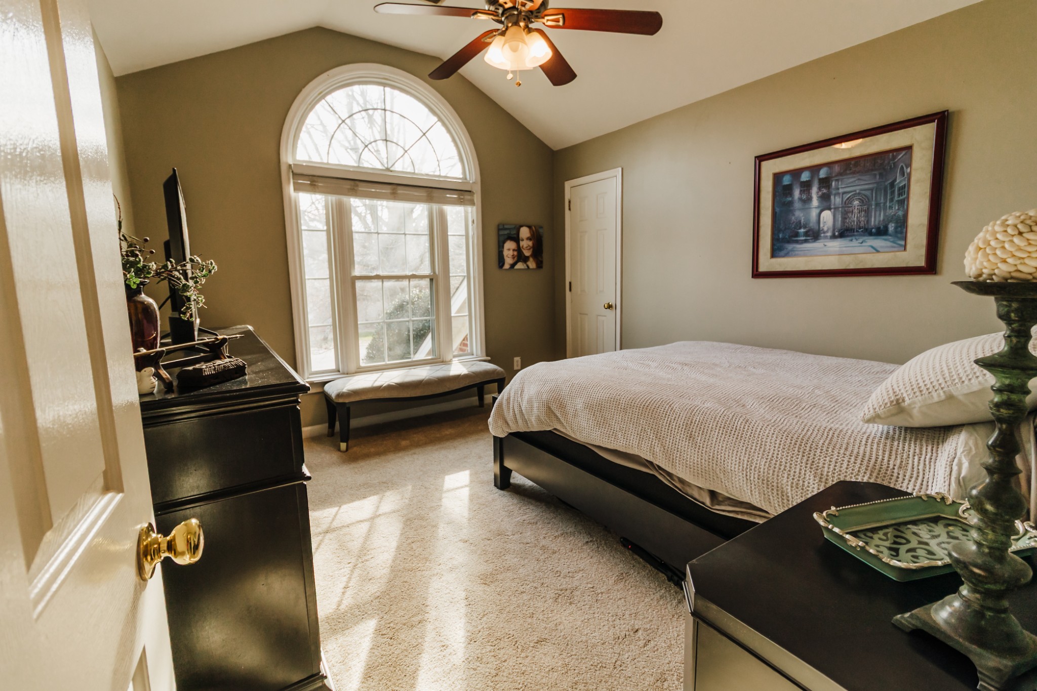 203 Savannah Ridge Murfreesboro, TN 37127 - Photo 39 of 60 a bedroom with a bed and a chandelier