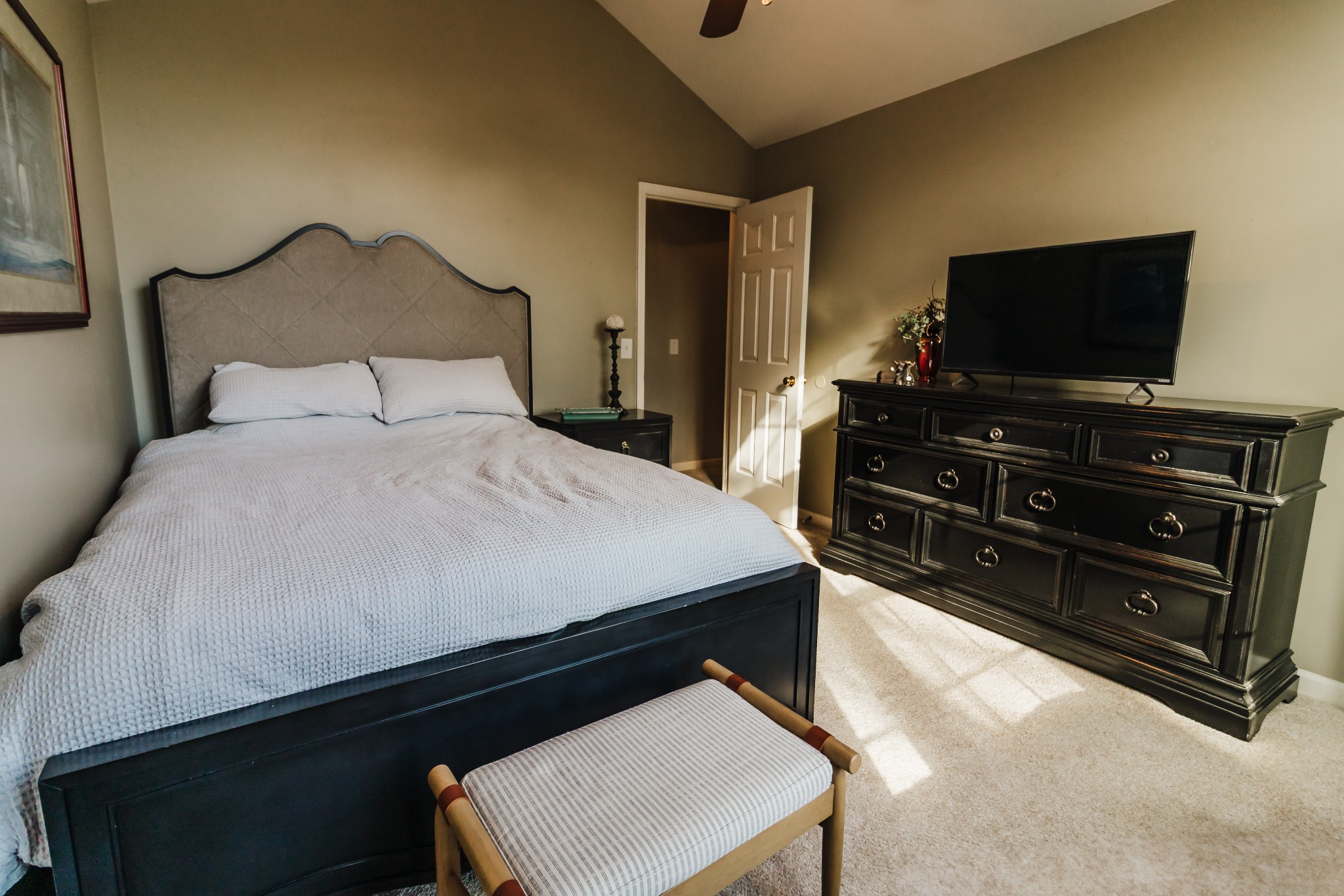 203 Savannah Ridge Murfreesboro, TN 37127 - Photo 40 of 60 a bedroom with a bed and flat screen tv