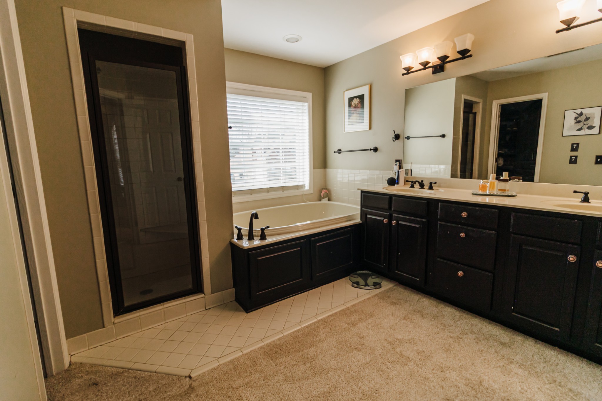 203 Savannah Ridge Murfreesboro, TN 37127 - Photo 41 of 60 a spacious bathroom with a tub sink shower and mirror