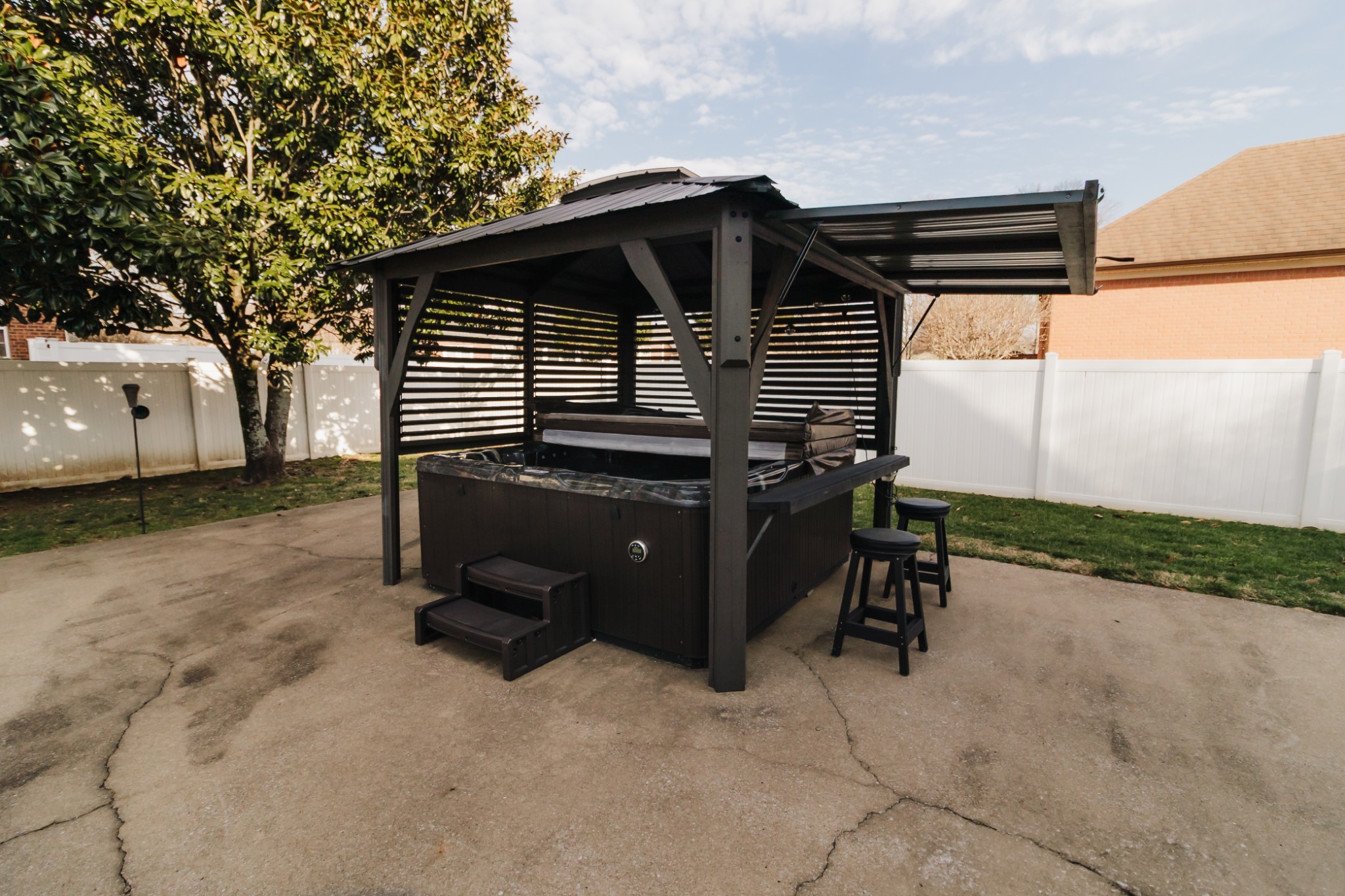 203 Savannah Ridge Murfreesboro, TN 37127 - Photo 51 of 60 a backyard of a house with table and chairs