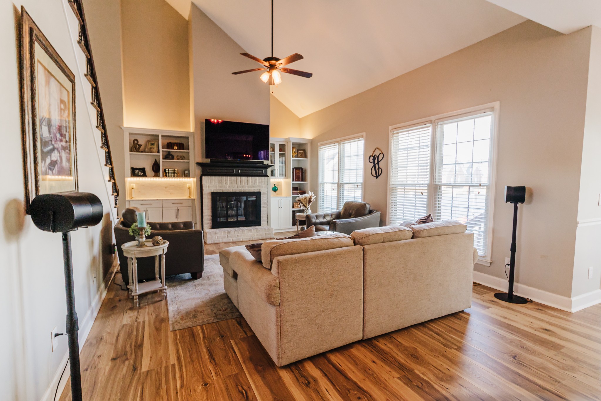 203 Savannah Ridge Murfreesboro, TN 37127 - Photo 6 of 60 a living room with furniture a flat screen tv and a fireplace