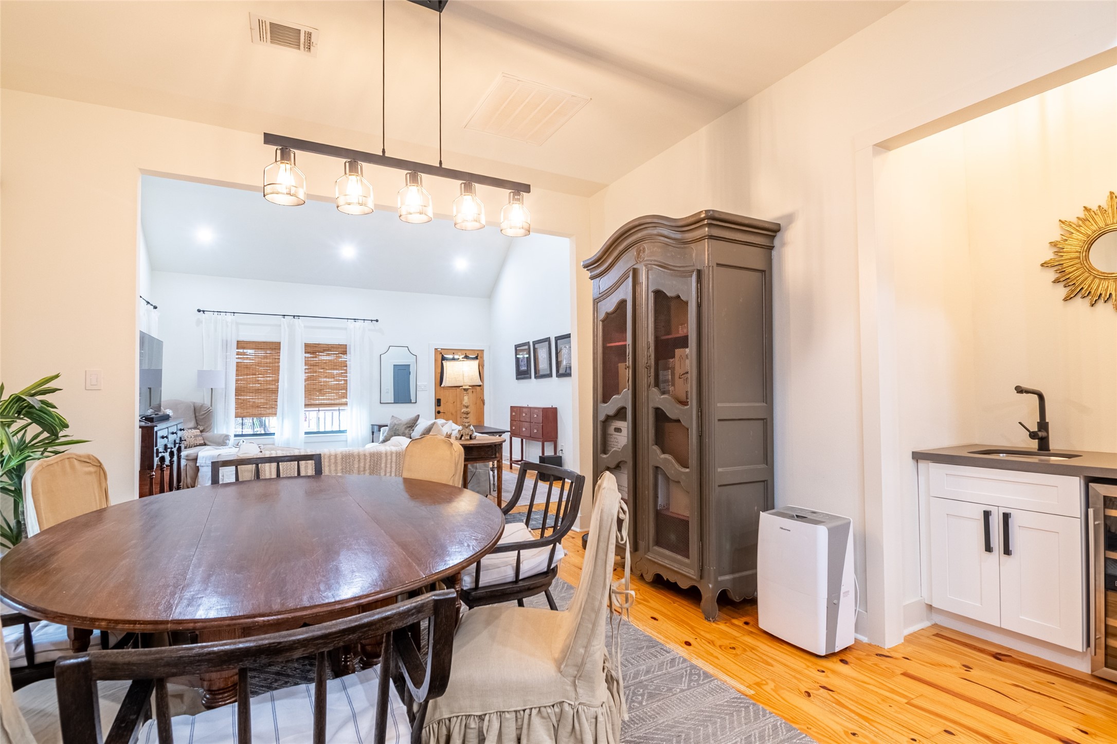 200 Carl Street Houston, TX 77009 - Photo 10 of 32 a view of a dining room with furniture and wooden floor