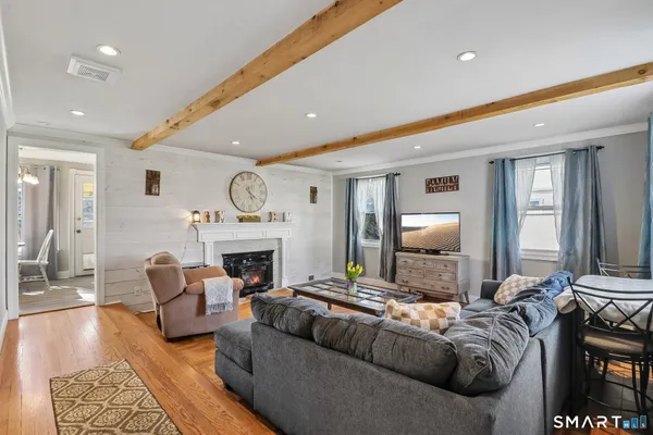 a bed room with furniture and a fireplace