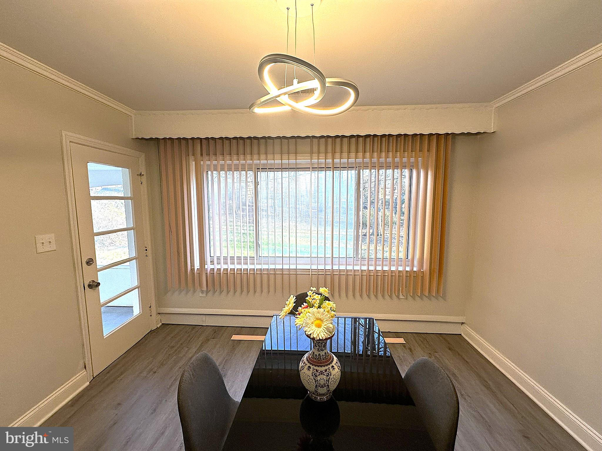 4121 Villa Nova Road Baltimore, MD 21207 - Photo 15 of 57 a living room with furniture and a large window