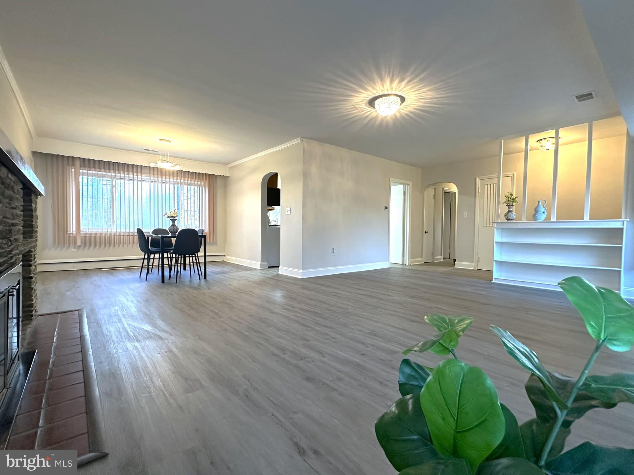 4121 Villa Nova Road Baltimore, MD 21207 - Photo 17 of 57 a dining room with furniture entryway and wooden floor