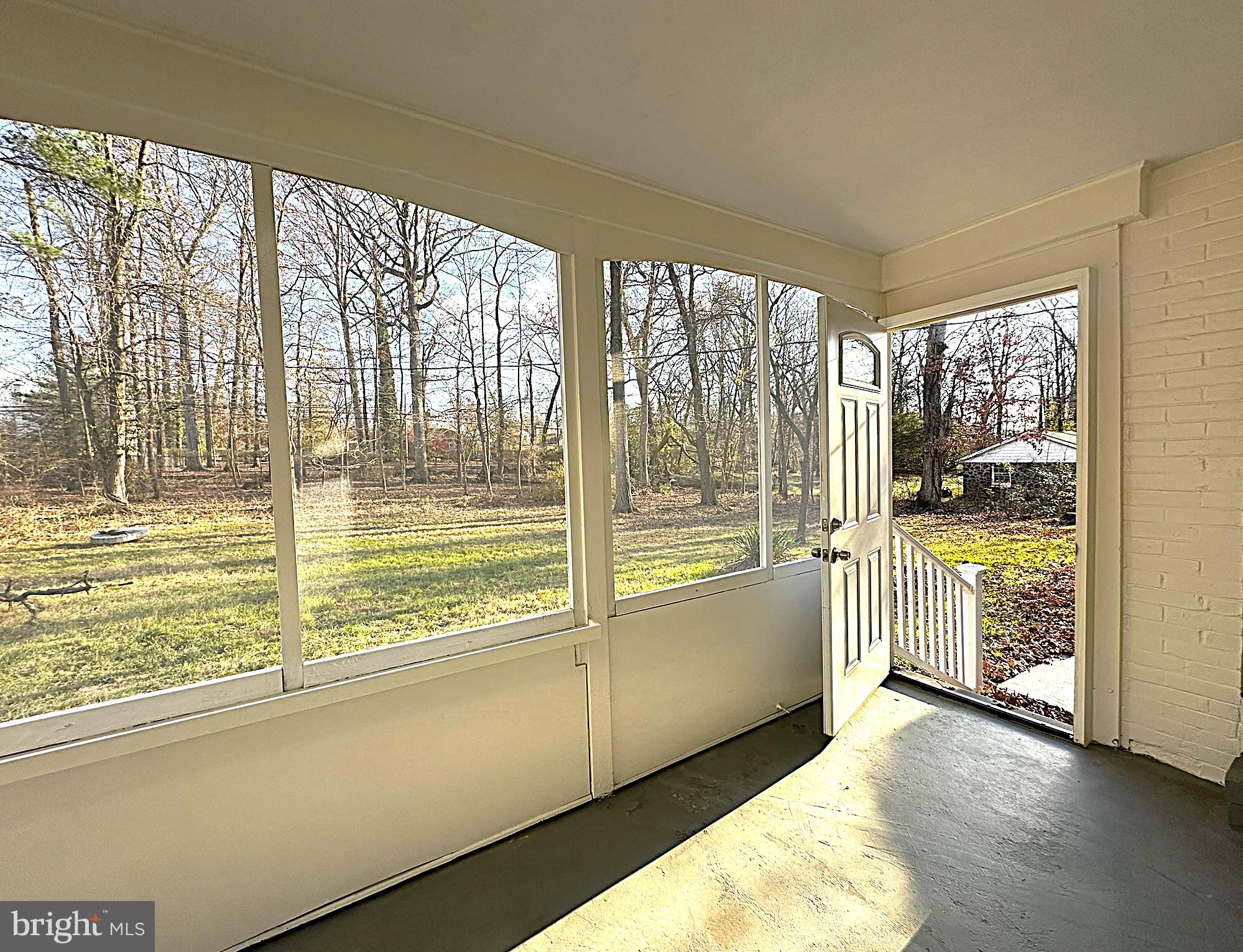 4121 Villa Nova Road Baltimore, MD 21207 - Photo 32 of 57 a view of a kitchen with an empty room and outdoor view