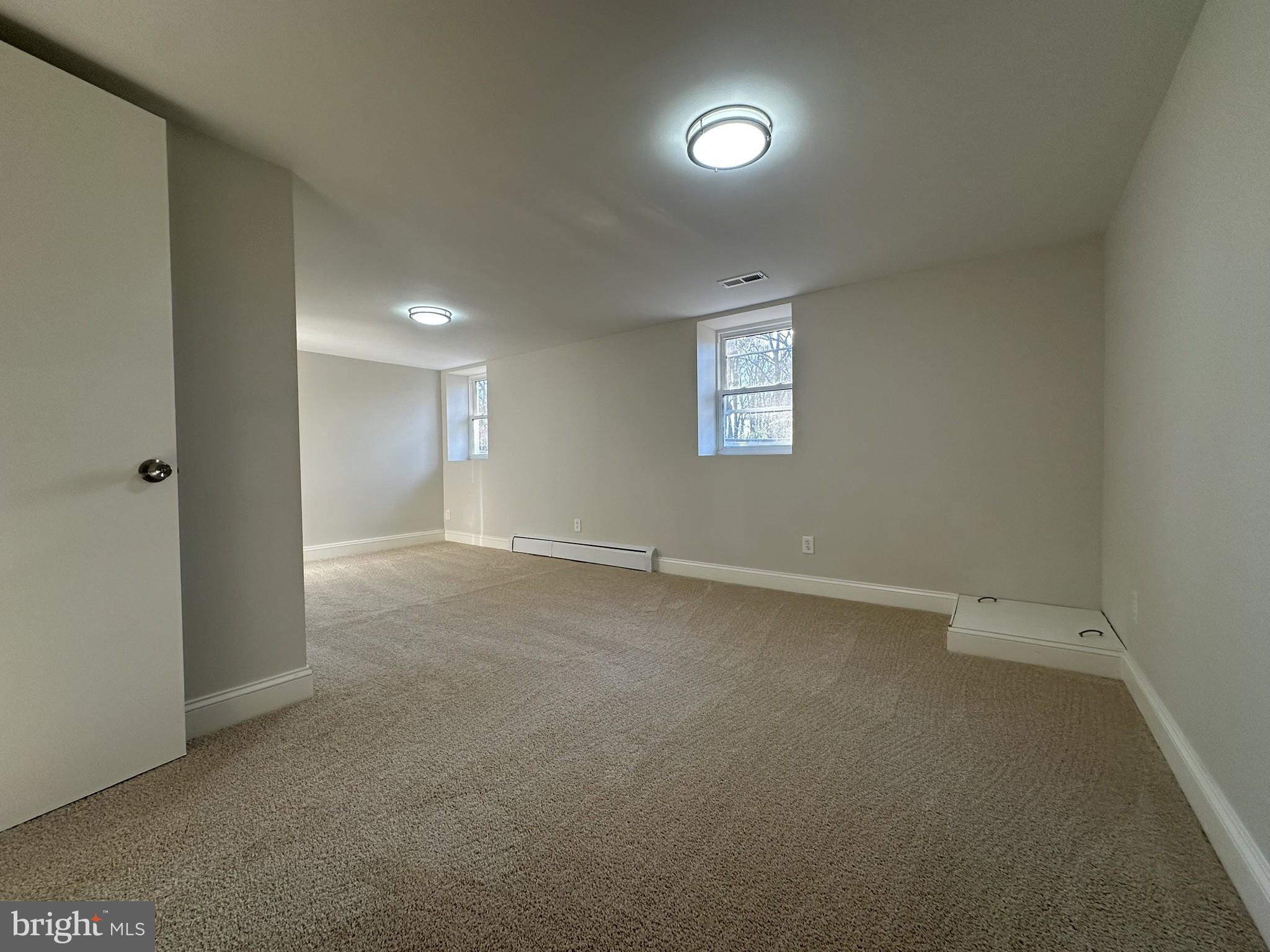 4121 Villa Nova Road Baltimore, MD 21207 - Photo 33 of 57 an empty room with a empty space and a window