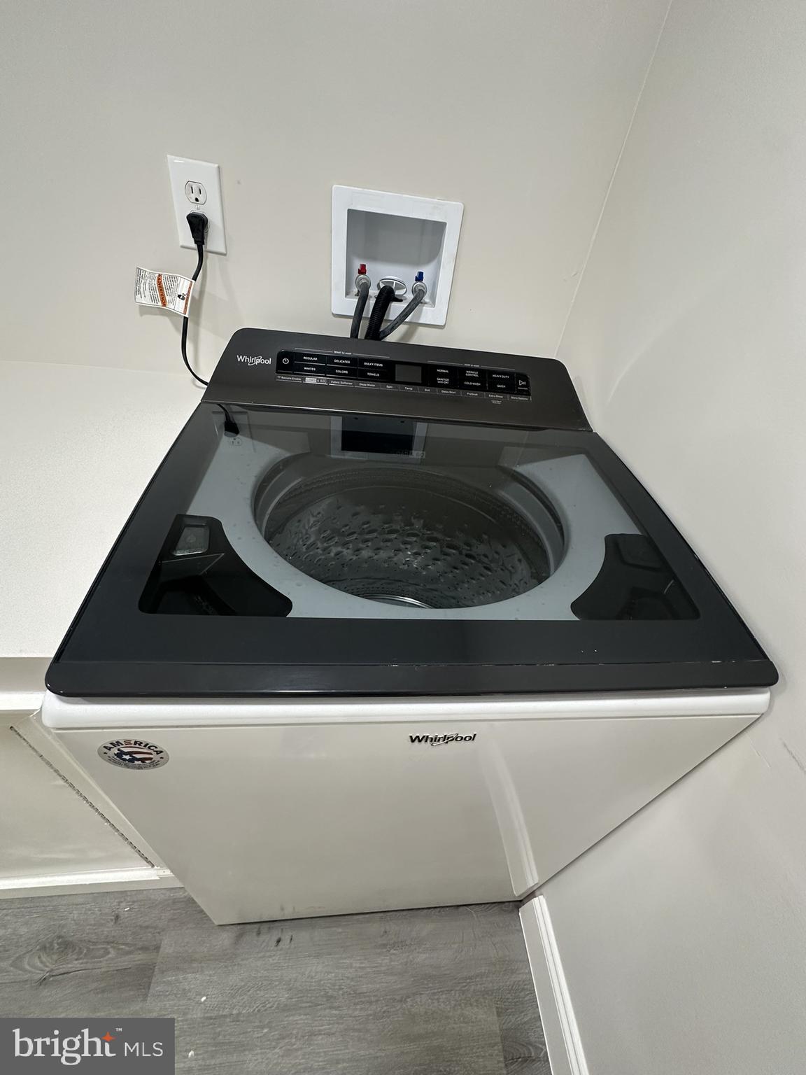 4121 Villa Nova Road Baltimore, MD 21207 - Photo 36 of 57 a close view of a stove a microwave and door