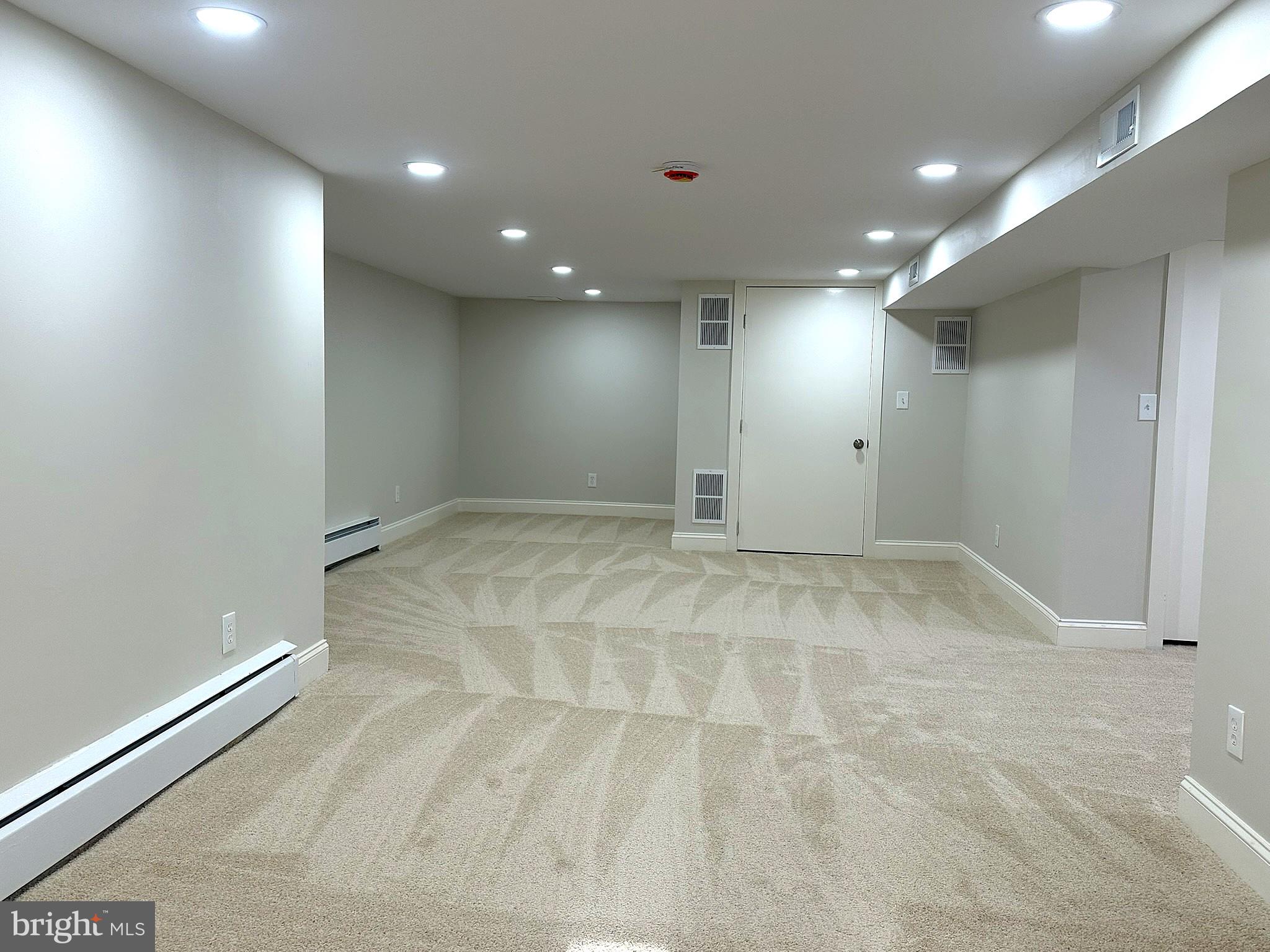 4121 Villa Nova Road Baltimore, MD 21207 - Photo 43 of 57 an empty room with wooden floor