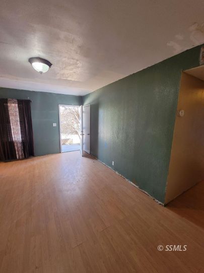 513 North Gold Canyon Street Ridgecrest, CA 93555 - Photo 2 of 10 a view of a big room with windows and closet