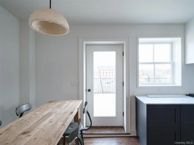 a workspace with furniture and a window