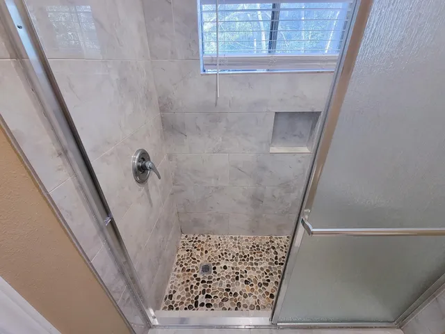 a bathroom with a window