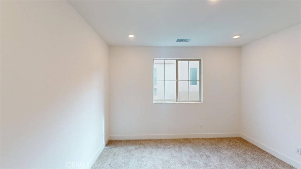 1689 Intrepid Lane San Pedro, CA 90732 - Photo 23 of 51 an empty room with a window