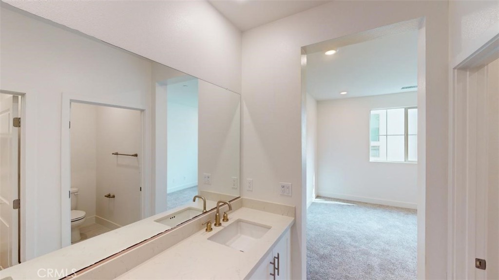 1689 Intrepid Lane San Pedro, CA 90732 - Photo 25 of 51 a bathroom with a sink and a mirror