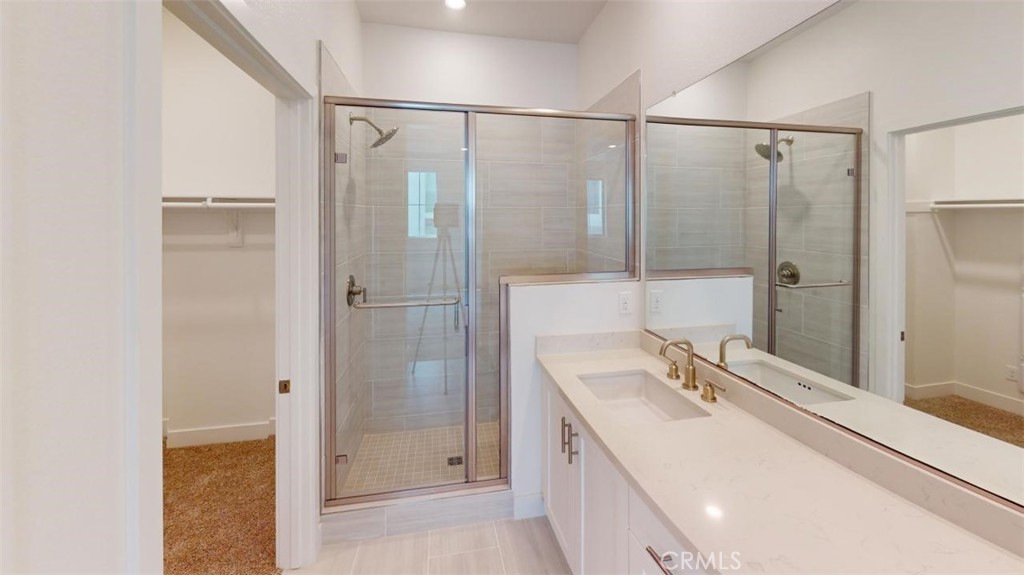 1689 Intrepid Lane San Pedro, CA 90732 - Photo 39 of 51 a bathroom with a shower sink and mirror