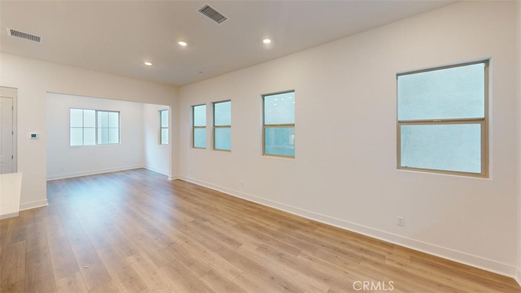 1689 Intrepid Lane San Pedro, CA 90732 - Photo 50 of 51 a view of empty room with wooden floor and fan