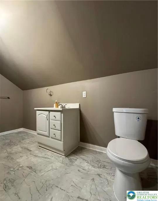 7 South Front Street, Unit A Coplay, PA 18037 - Photo 15 of 17 a bathroom with a toilet and a vanity