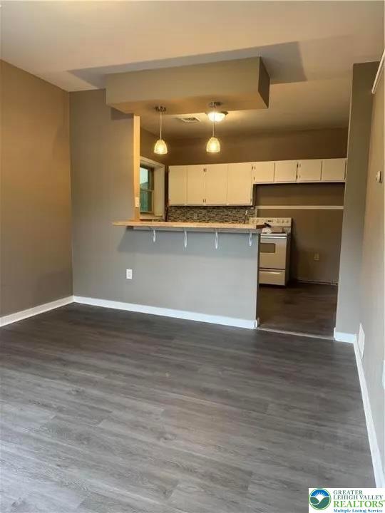 7 South Front Street, Unit A Coplay, PA 18037 - Photo 5 of 17 a view of a kitchen with a refrigerator and a window