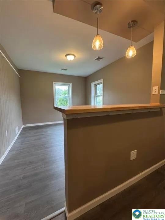 7 South Front Street, Unit A Coplay, PA 18037 - Photo 6 of 17 a view of an empty room with window and wooden floor