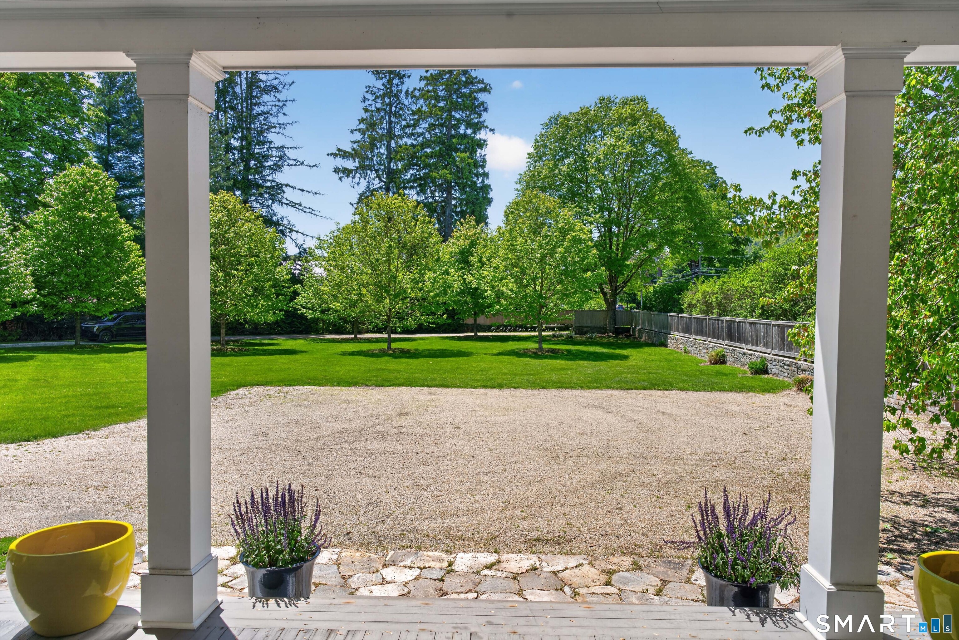 100 North Main Street Kent, CT 06757 - Photo 40 of 40 a view of a garden with plants and large tree
