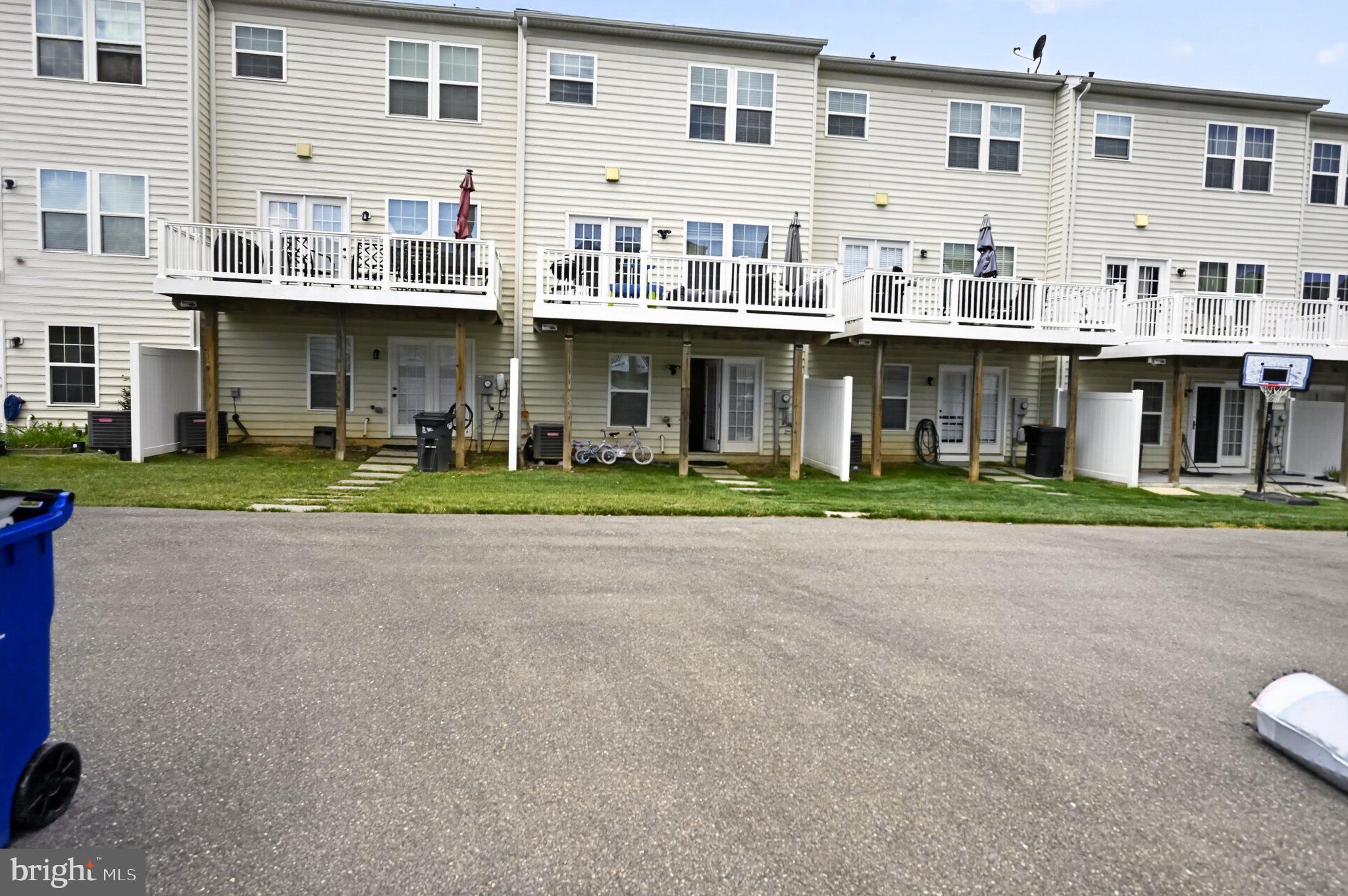 6357 Walcott Lane Frederick, MD 21703 - Photo 33 of 35 Charming townhomes with inviting decks.