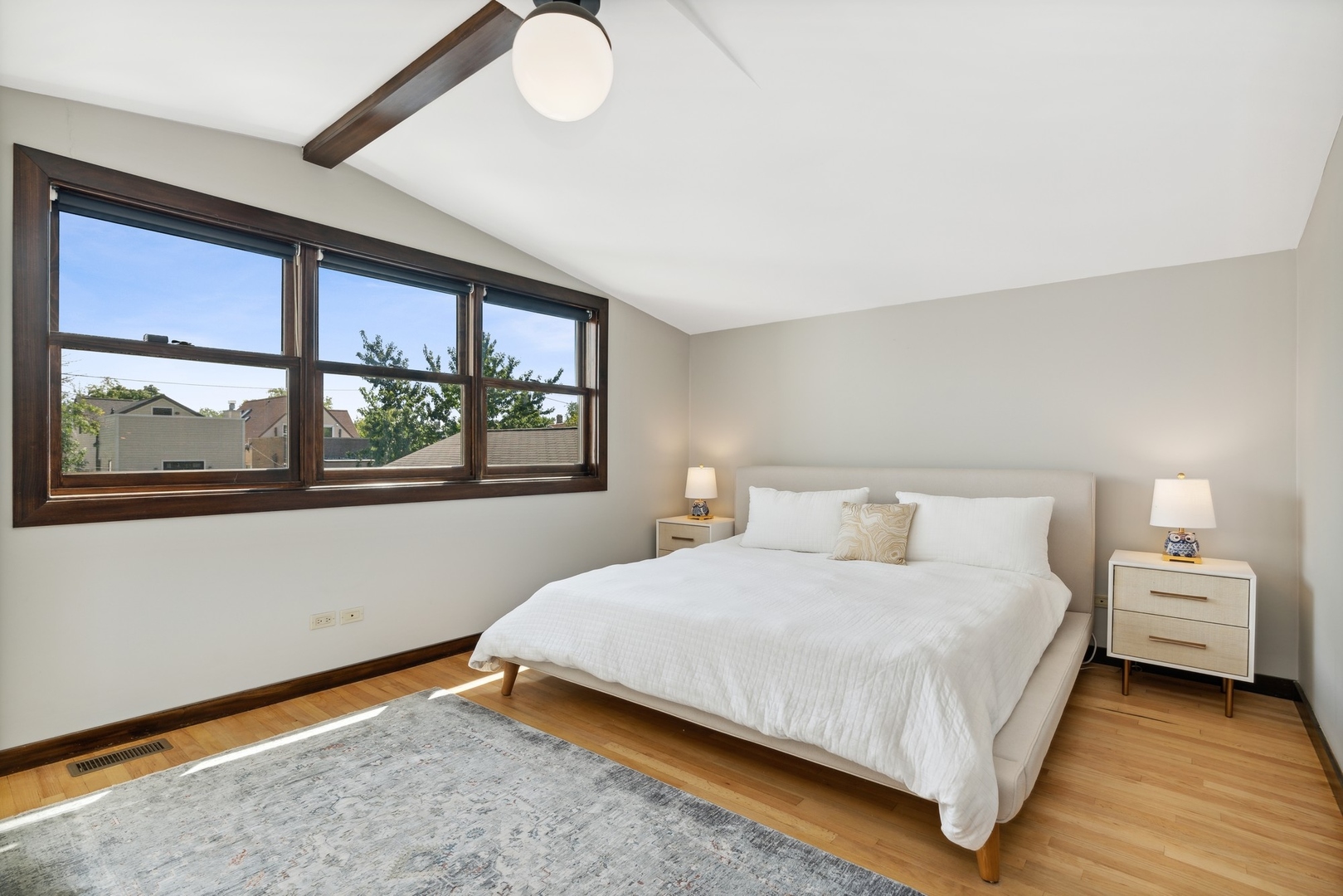 3317 North Bell Avenue Chicago, IL 60618 - Photo 16 of 30 a bedroom with a bed and window