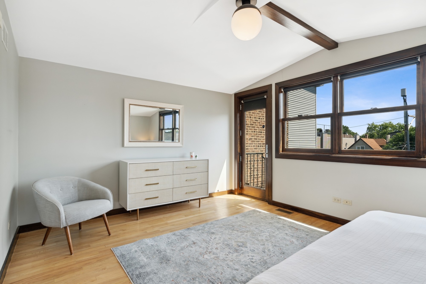 3317 North Bell Avenue Chicago, IL 60618 - Photo 17 of 30 a view of a bedroom with furniture and window