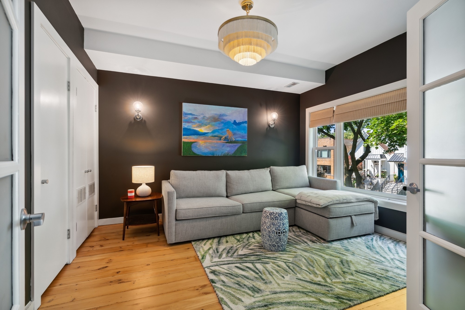 3317 North Bell Avenue Chicago, IL 60618 - Photo 21 of 30 a living room with furniture and a flat screen tv