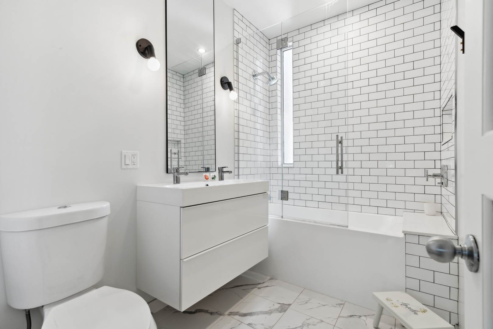 3317 North Bell Avenue Chicago, IL 60618 - Photo 24 of 30 a bathroom with a sink toilet and shower