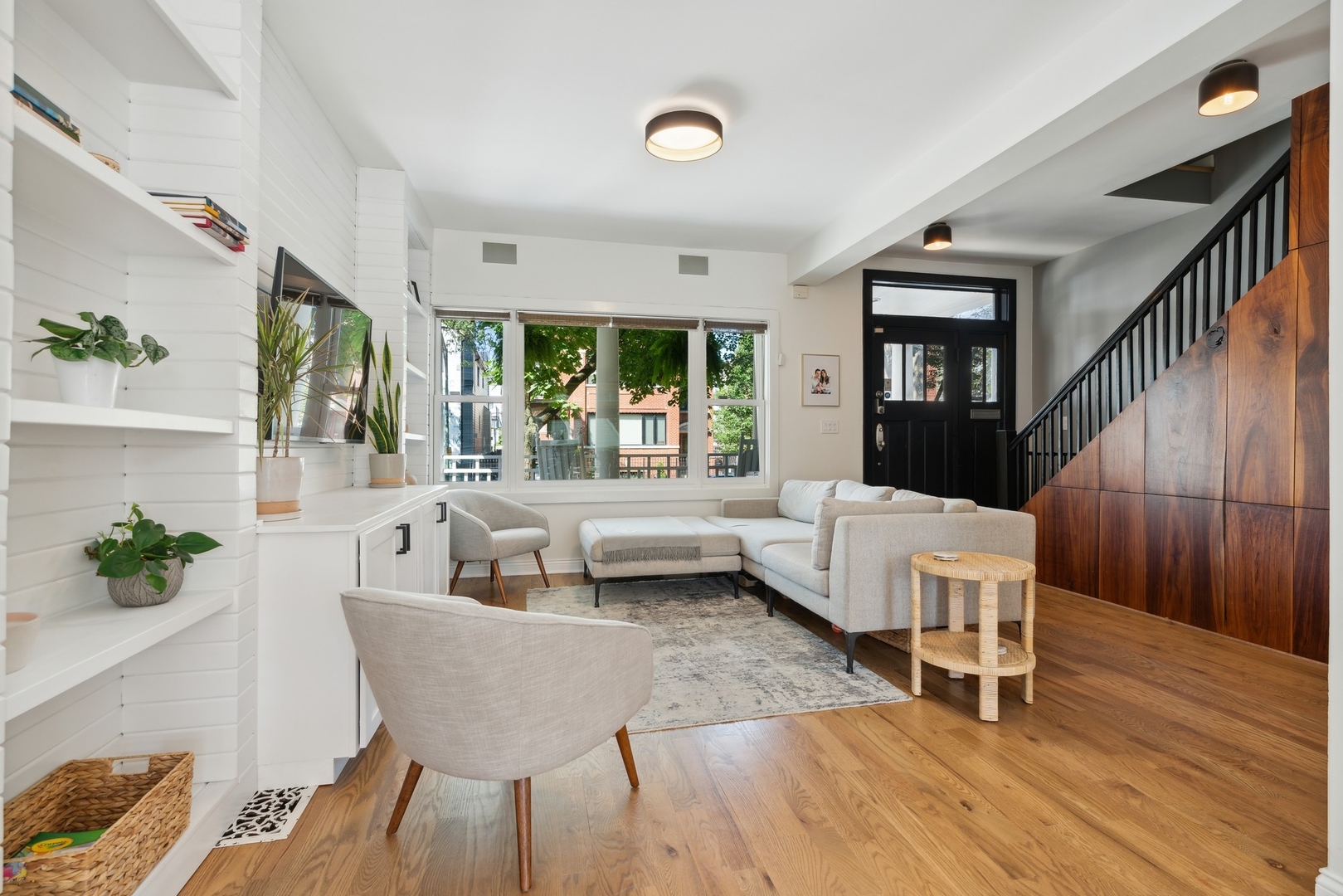3317 North Bell Avenue Chicago, IL 60618 - Photo 5 of 30 a living room with furniture and a large window