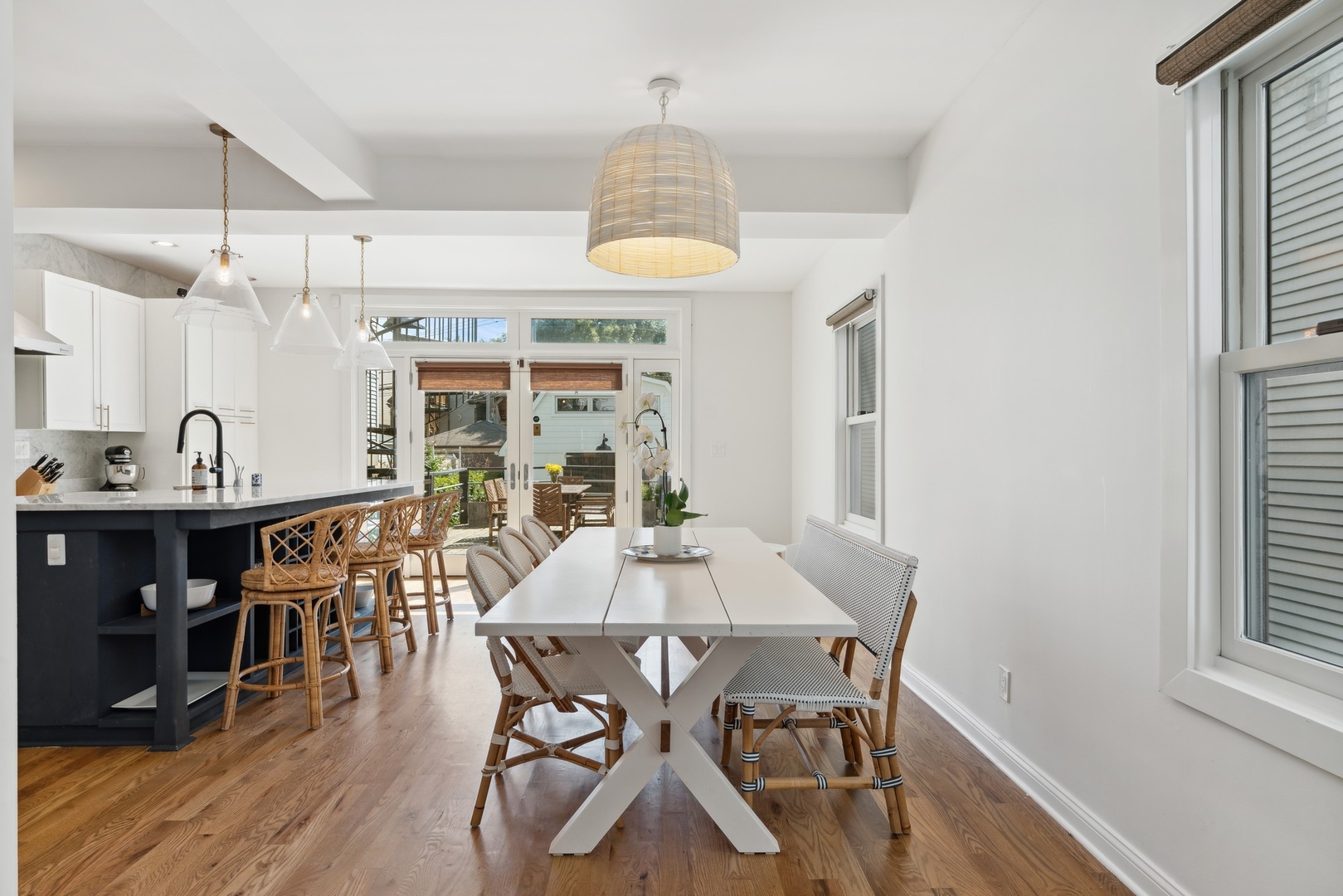 3317 North Bell Avenue Chicago, IL 60618 - Photo 10 of 30 a view of a dining room with furniture window and wooden floor