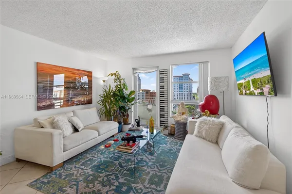 a living room with furniture and a couch