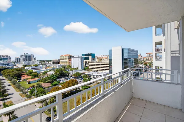 a view of a city from a balcony