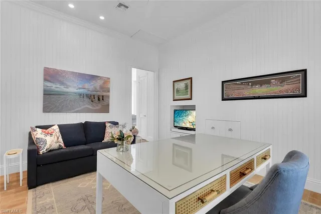 a living room with furniture and a couch