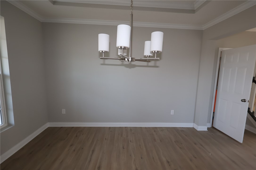 230 Tilly Court, Unit 4 Springboro, OH 45066 - Photo 5 of 20 This versatile room offers an open canvas for your design aspirations, bathed in natural light.