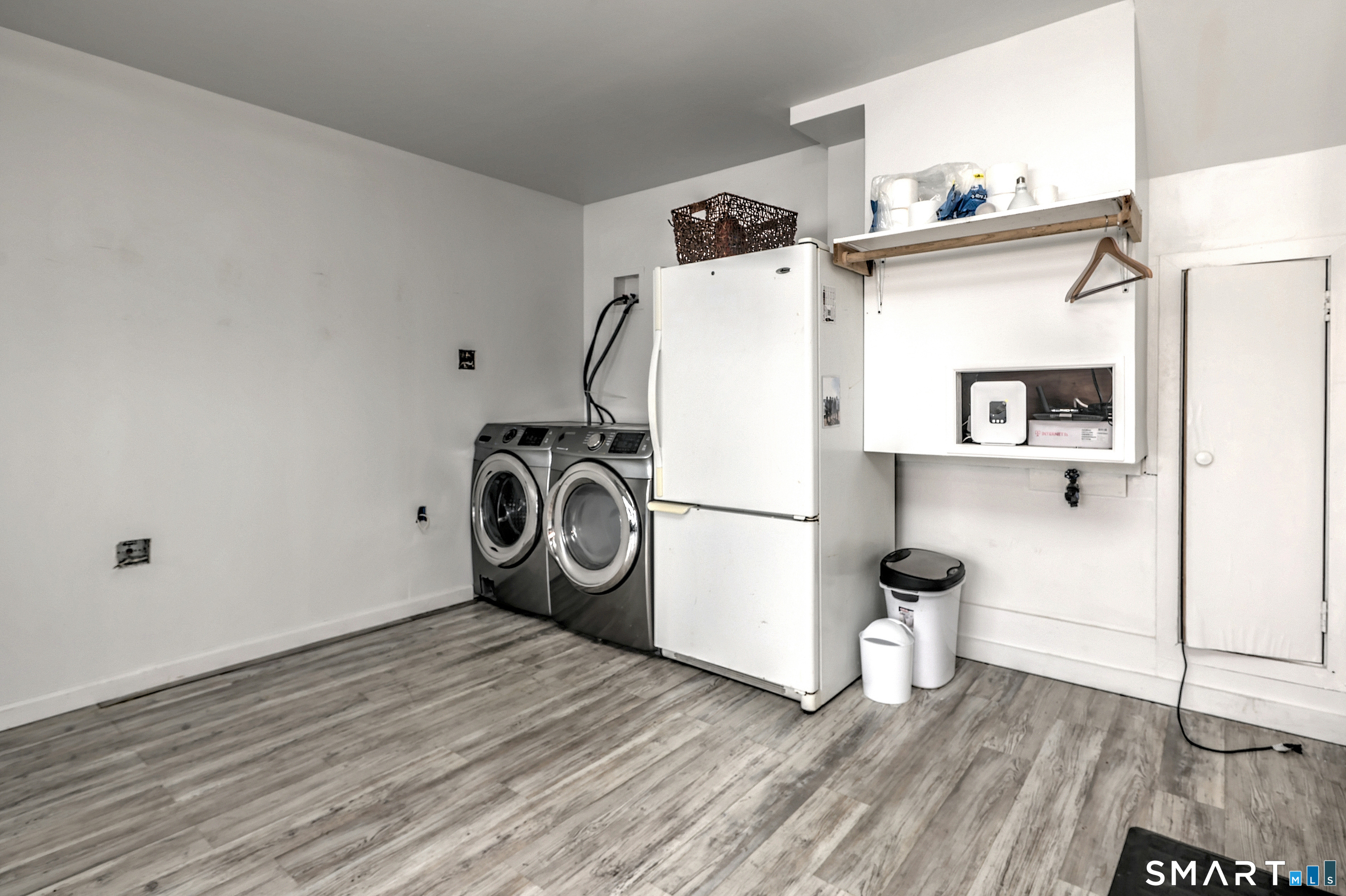 229 Front Street, Unit 1 New Haven, CT 06513 - Photo 34 of 39 Semi-finished garage space with laundry area.