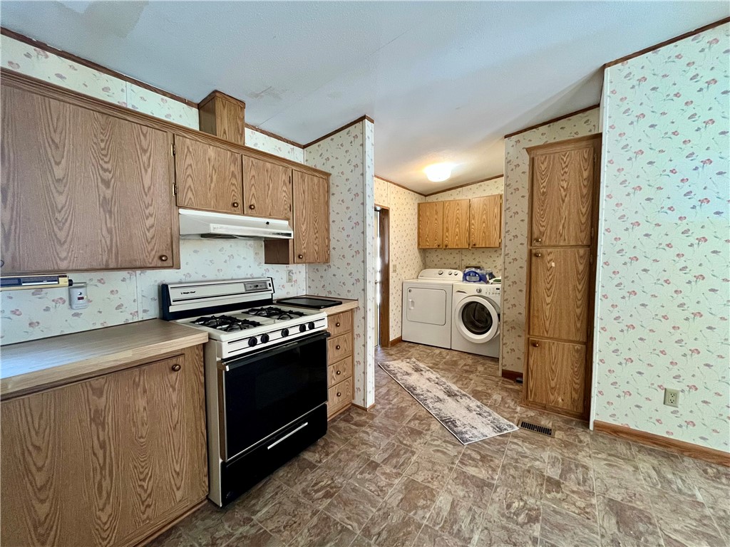 9207 Wayne Center Road Rose, NY 14489 - Photo 12 of 24 1st floor laundry room off the kitchen area. Wash