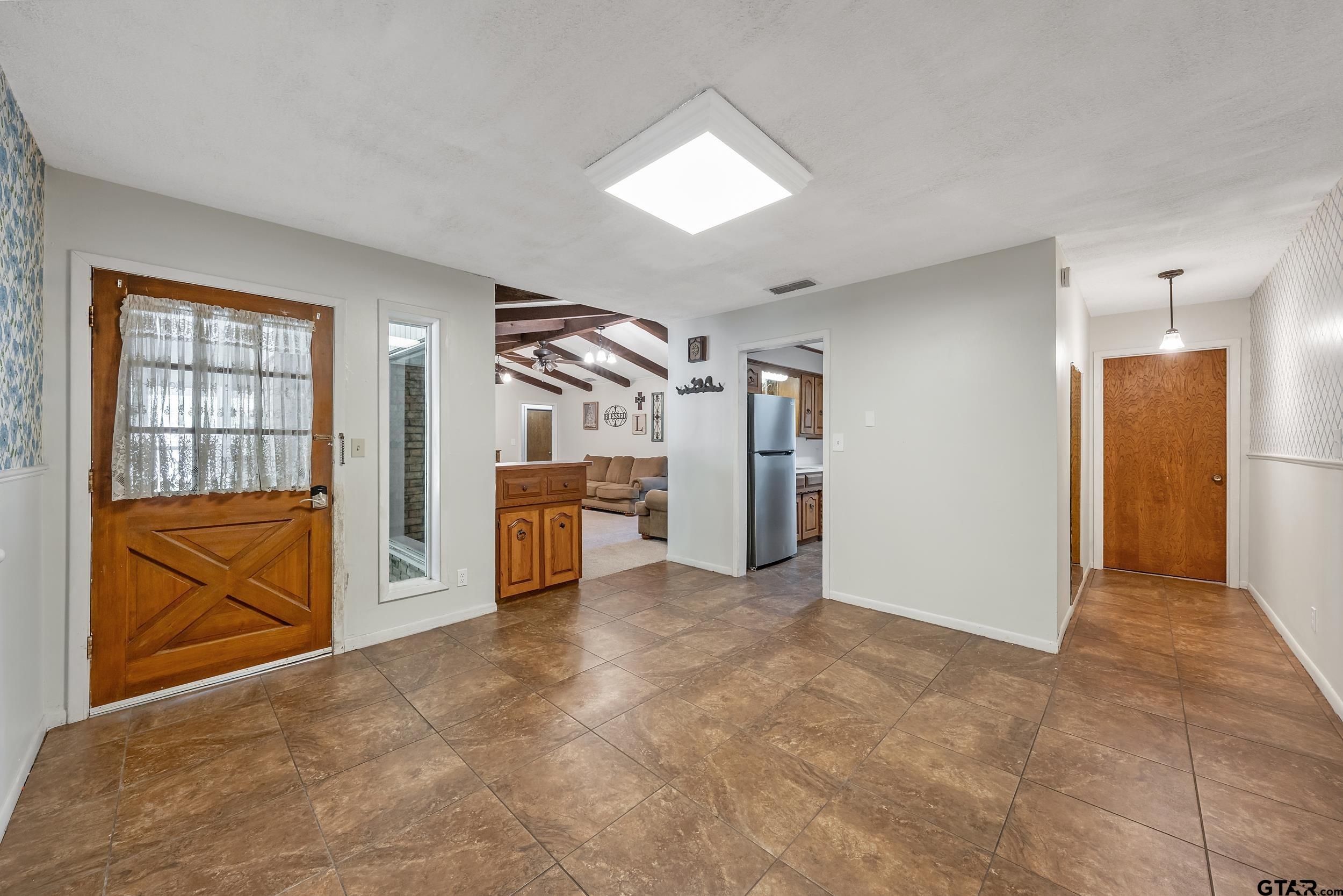 150 Rodney Hawkins, TX 75765 - Photo 12 of 36 a view of a kitchen with furniture and refrigerator